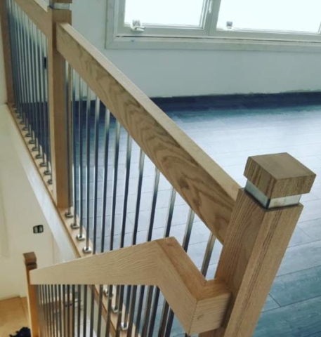 Wood railing with metal spindles